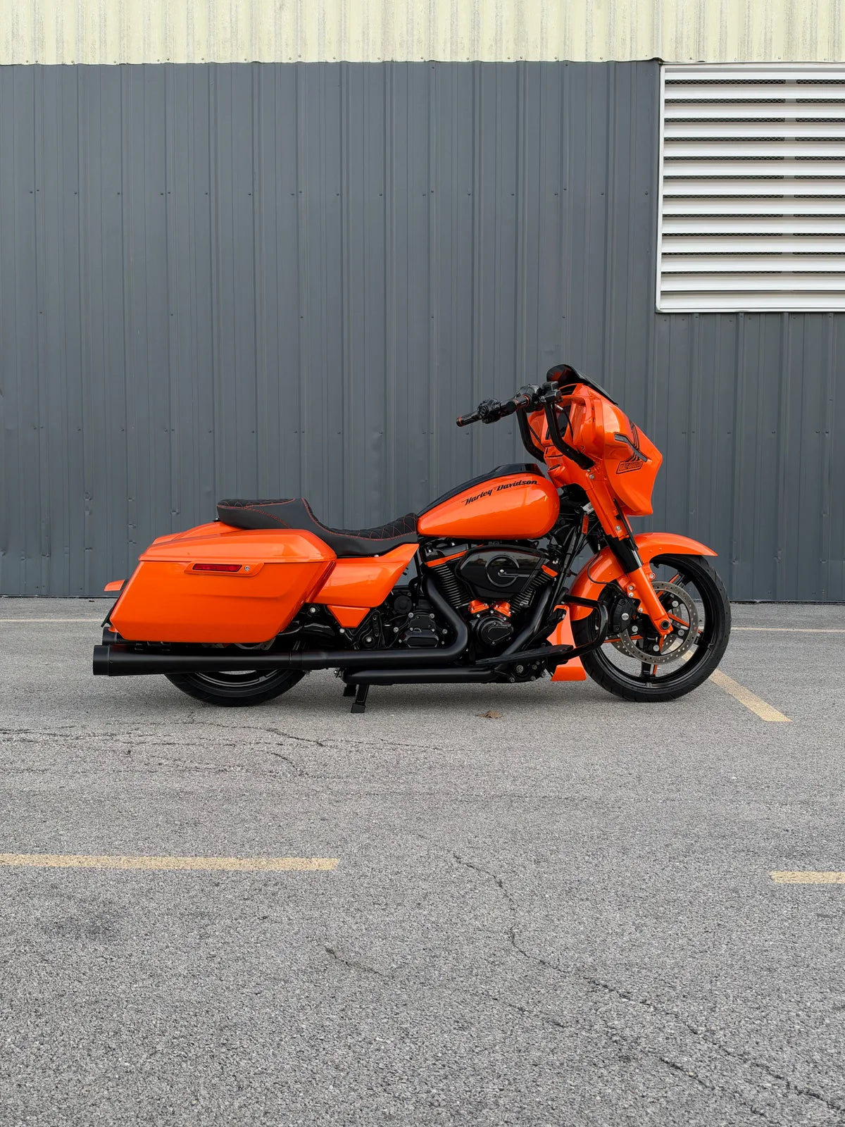 INFERNO from the side: House of Kolor Tangelo, true dual headers, gloss black wheels with orange accents, Sinister seat