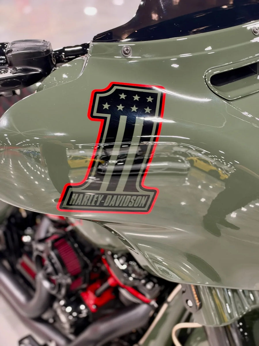 SERGEANT fairing with the red and black number one graphic, red-accented engine below