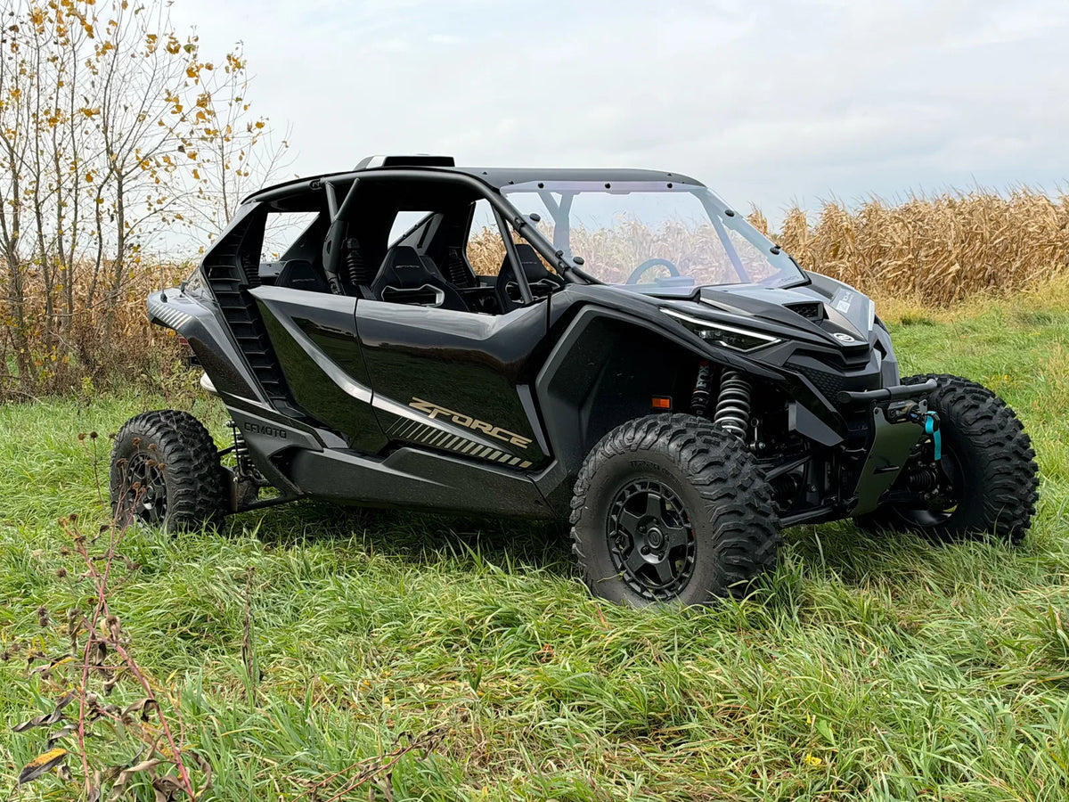 The actual prize unit, a black 2026 CFMOTO ZFORCE Z10-4, in a field