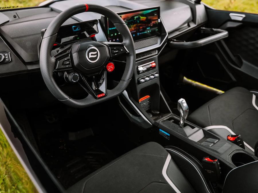 Cockpit of the actual prize unit: wheel, touchscreen and seats